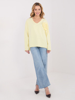 Jasnożółta bluzka z kwiatową aplikacją 3D