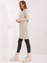 Hurtownia Jasnobeżowa sukienka oversize z dzianiny w warkocze RUE PARIS