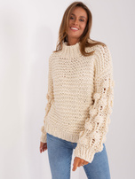 Hurt Jasnobeżowy sweter oversize z grubym splotem 