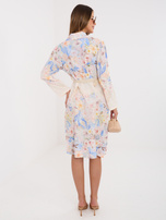 Blue shirt dress with a belt.