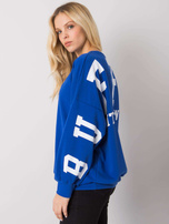 Modra majica s tiskom Brooke.