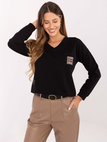 Black casual blouse with 3/4 sleeves.