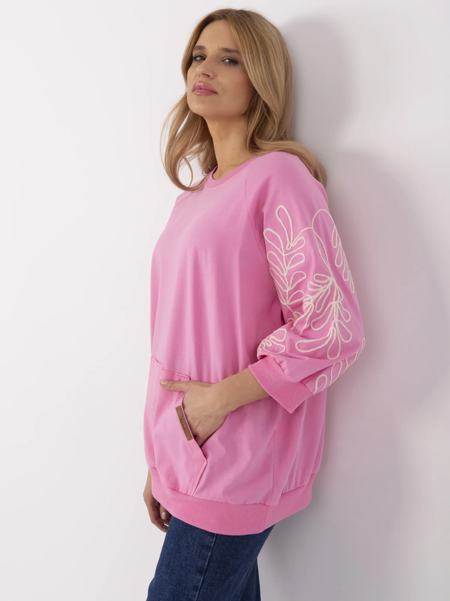 Rosa Damen Kapuzenpullover aus Baumwolle.