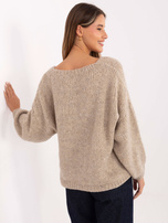 Beige Damenpullover mit Korsettbindung.