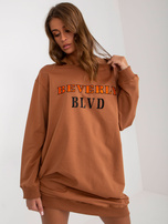 Hurt Jasnobrązowa długa bluza z nadrukiem i aplikacją  