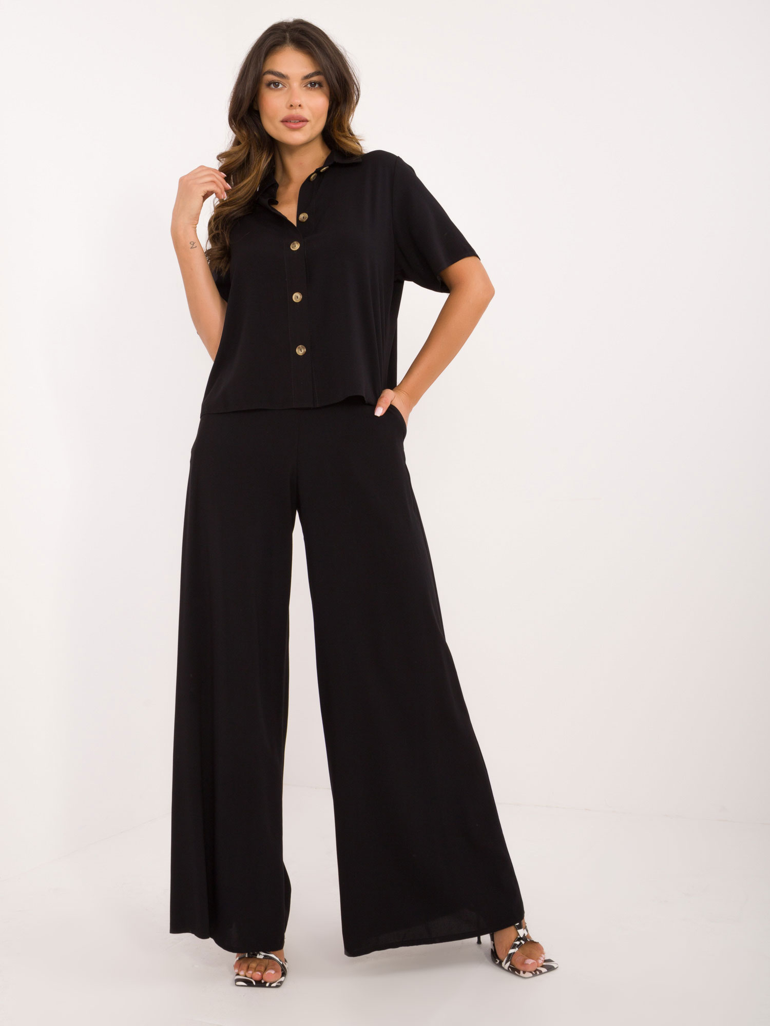 Hurt Black women's summer set with a button-up shirt.