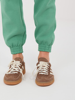 Pistacjowe ocieplane spodnie basic z kieszeniami