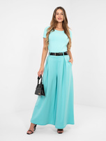 Miętowe dresowe spodnie palazzo z paskiem RUE PARIS 