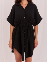 Black muslin dress with short sleeves.