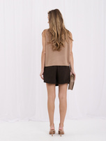 Brown houndstooth wrap shorts.