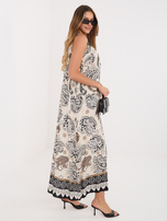 Black trapeze dress with patterns.