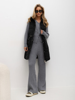 Black quilted vest with waist adjustment.