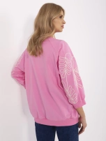 Pink women's hoodie made of cotton.