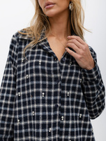 Navy checkered shirt with shiny embellishment.