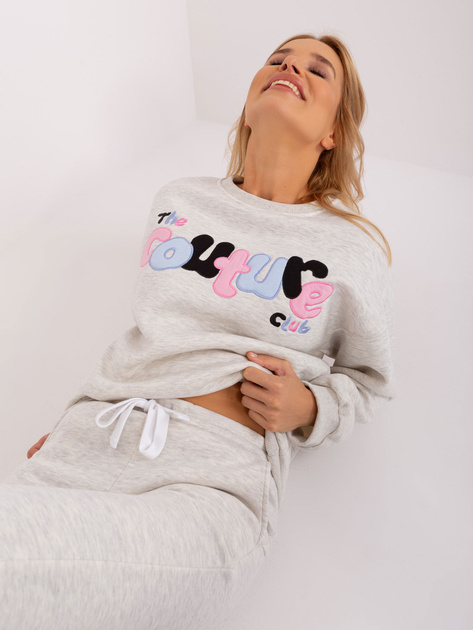 Hurtownia Jasnoszary melanżowy komplet dresowy z napisem