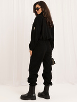 Black corduroy set with jogger pants.