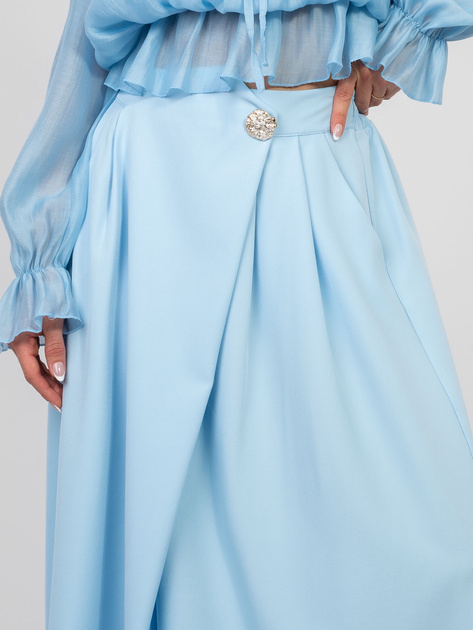 Pastelowa niebieska elegancka spódnica midi