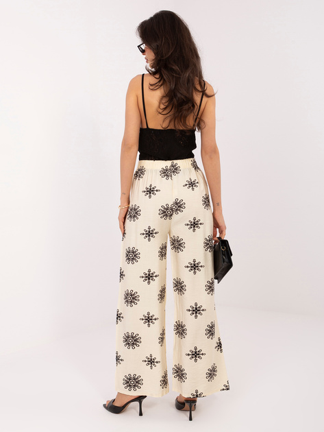 Jasnobeżowo-czarne damskie spodnie palazzo na lato