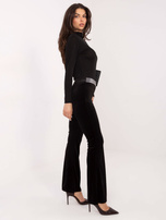 Czarne welurowe spodnie dzwony na imprezę  