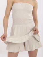 Beżowy kombinezon z elastycznym marszczeniem