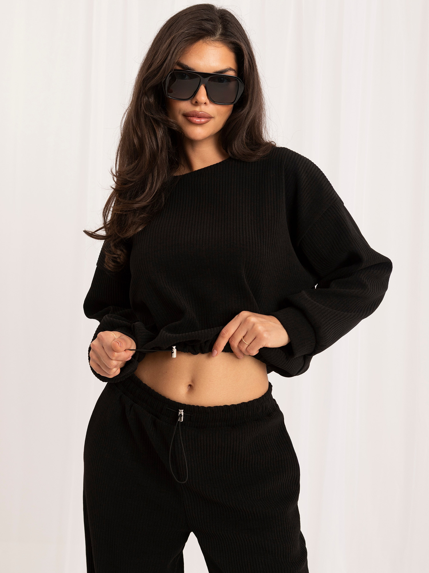Black corduroy set with a sweatshirt without a hood.