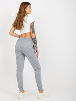 Hurtownia Szare damskie spodnie dresowe z kieszeniami