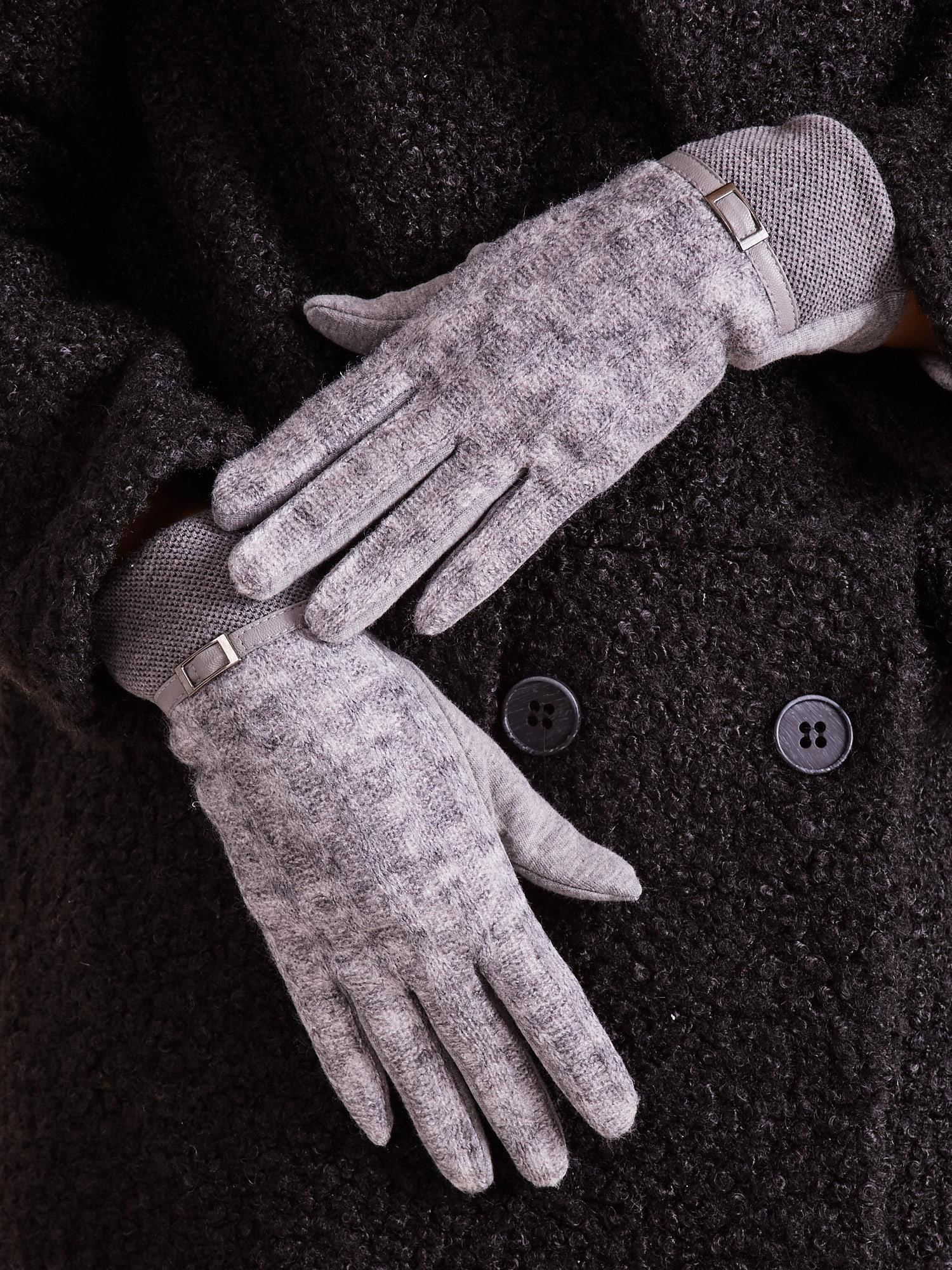 Graue Handschuhe mit Strickeinsatz.