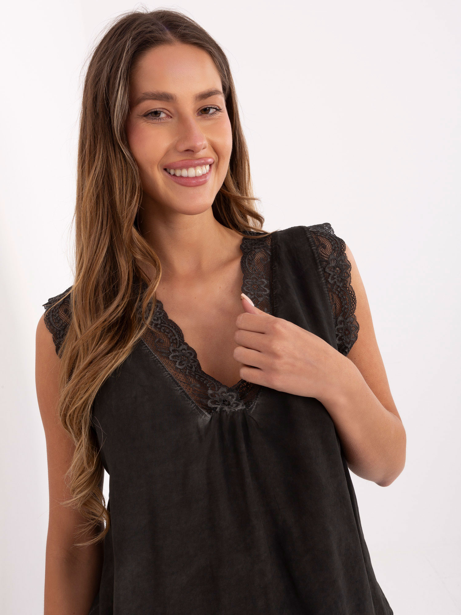 Graphite loose top with a V-neck.