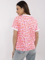 Fluorescent pink and white blouse with a round neckline.