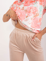 Hurt Beżowo-koralowy komplet welurowy z nadrukiem RUE PARIS