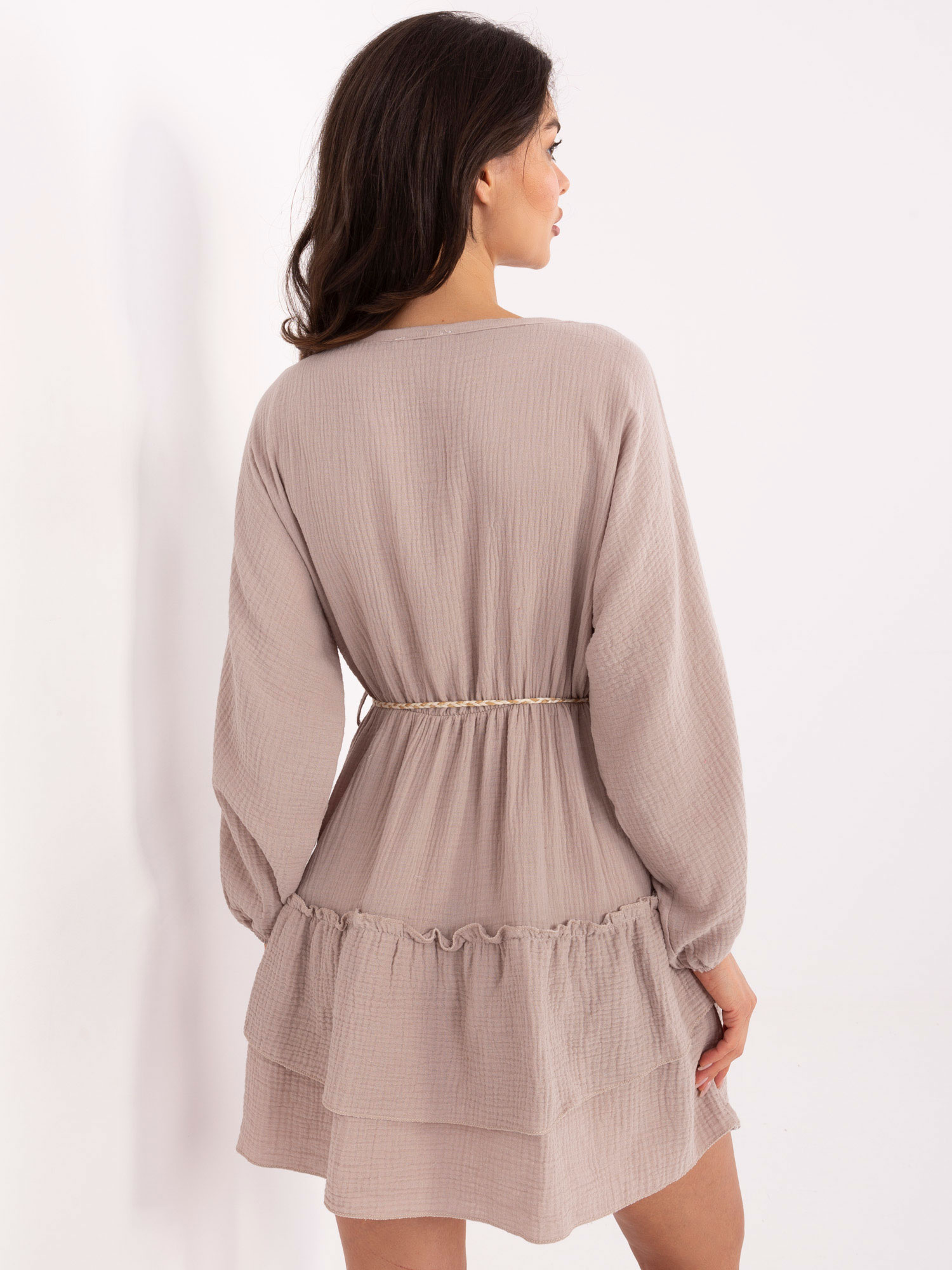 Dark beige muslin dress with a frill.