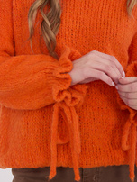 Pomarańczowy sweter oversize ze ściągaczami