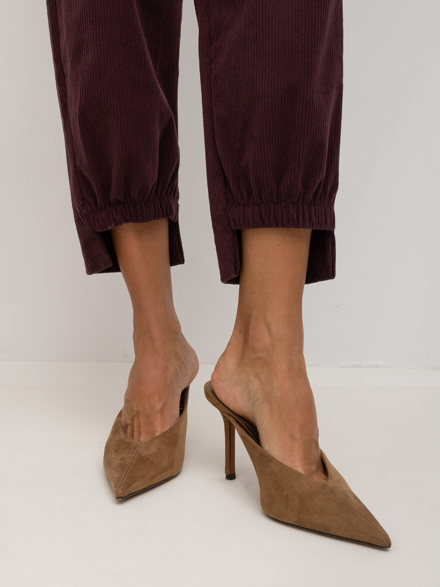 RUE PARIS Burgundy corduroy trousers with tapered leg.