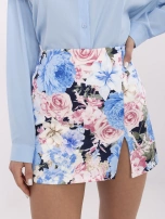 Blue-pink skirt-shorts with a slit.