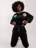 Großhandel Schwarzes Velours-Set mit Blumenjacke.