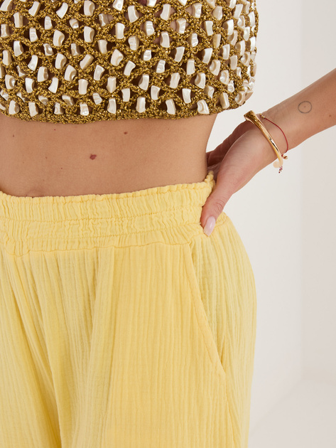 Jasnożółte muślinowe spodnie z wysokim stanem