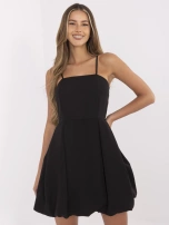 Black cocktail dress with pleats.