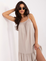 Beżowa rozkloszowana sukienka z falbaną 