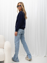 Navy women's sweatshirt with a shiny bear motif.