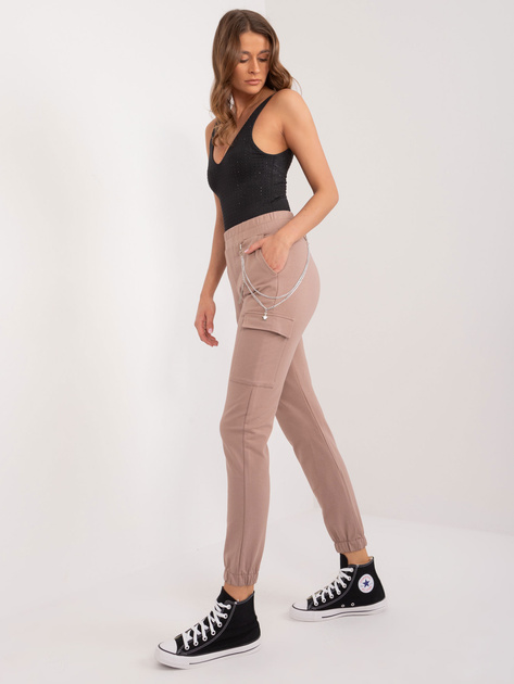 Hurtownia Ciemnobeżowe spodnie damskie dresowe ze ściągaczami