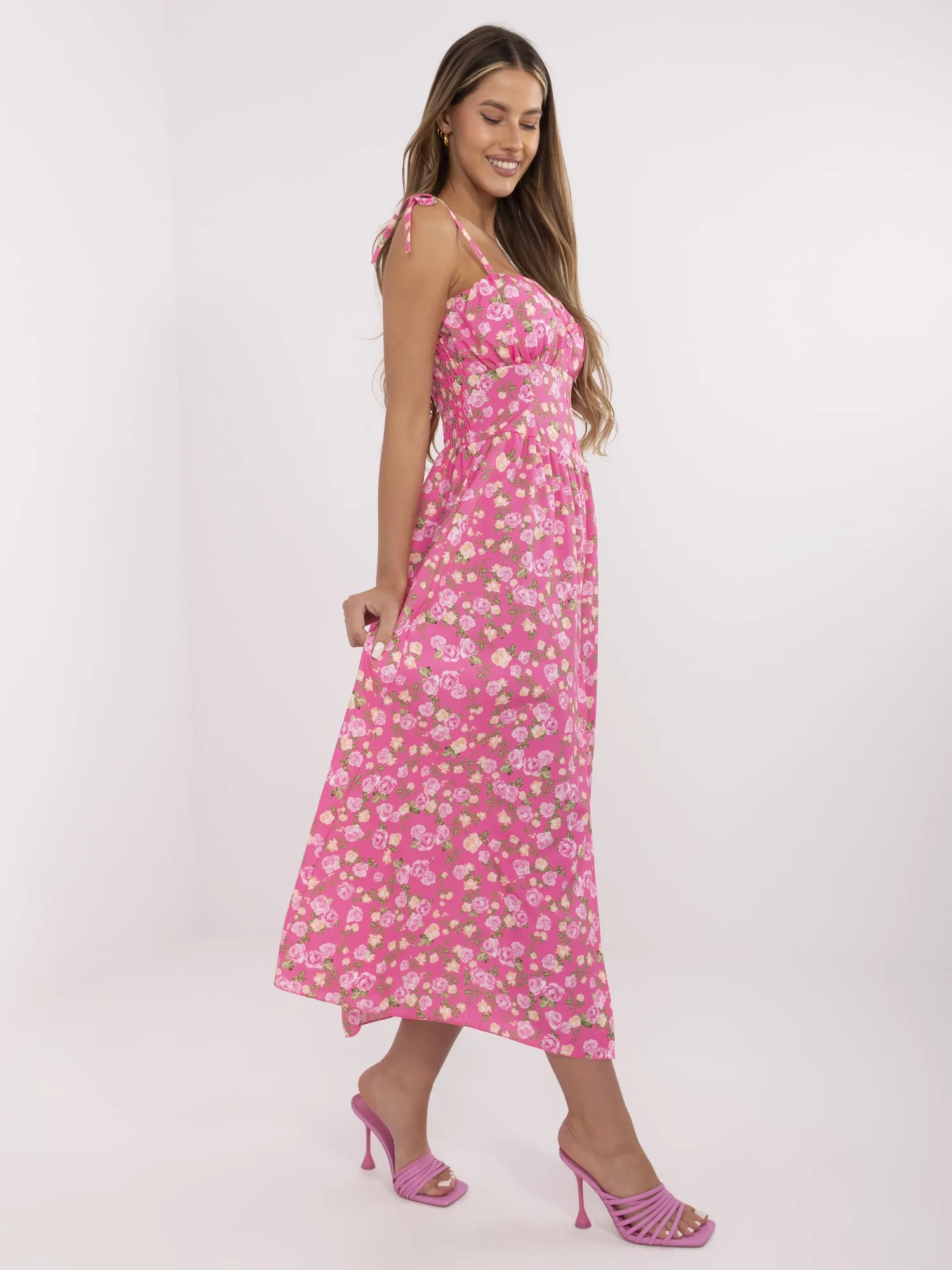 Pink summer dress with a corset waist.