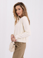 Ecru eleganter Cardigan mit strukturierten Mustern.