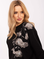 Hurt Czarna damska bluzka z aplikacją z dżetów 