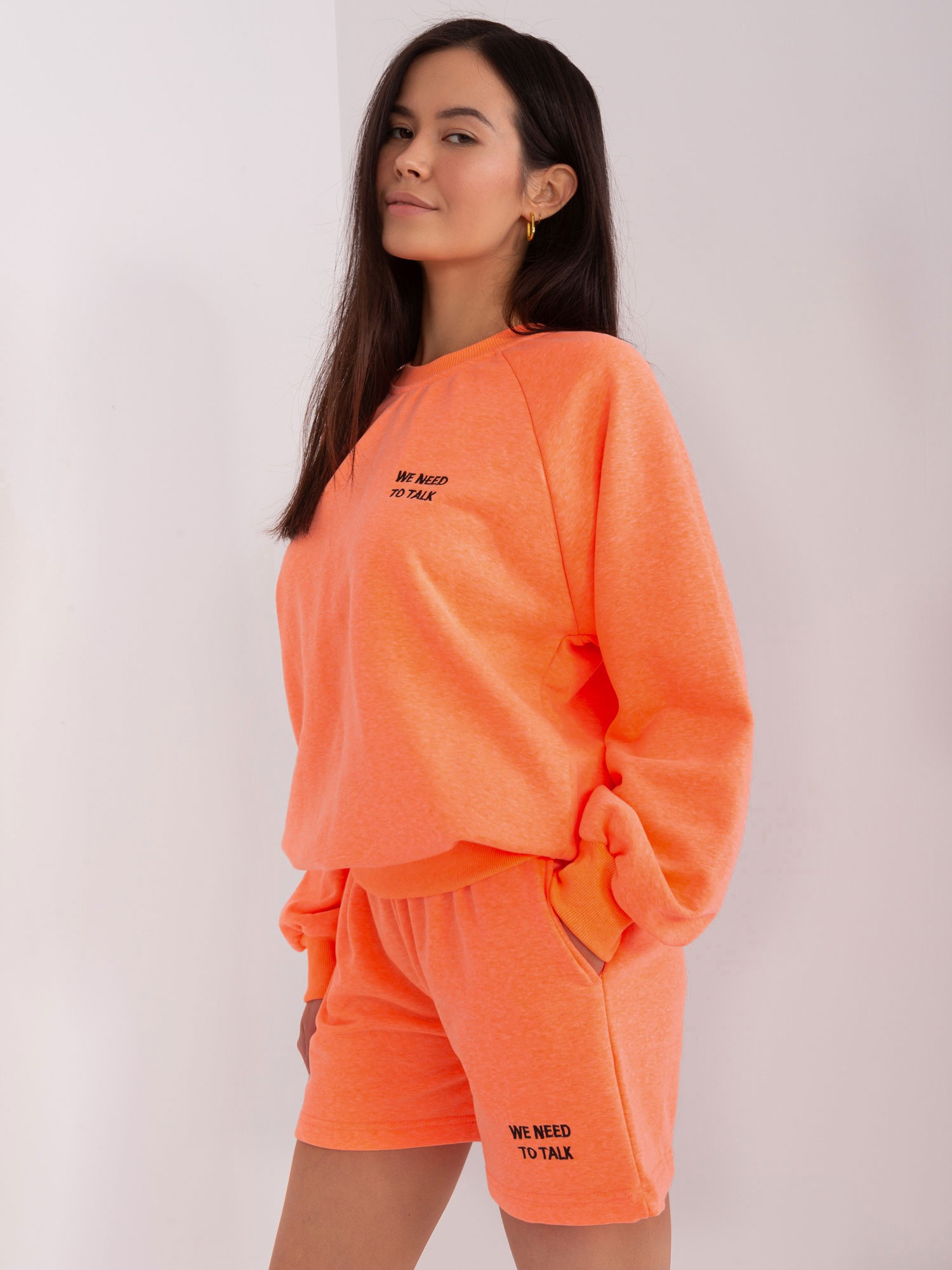 Hurt Fluo orange Jogginganzug mit Shorts.