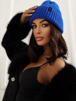 Blue winter beanie hat with a patch.