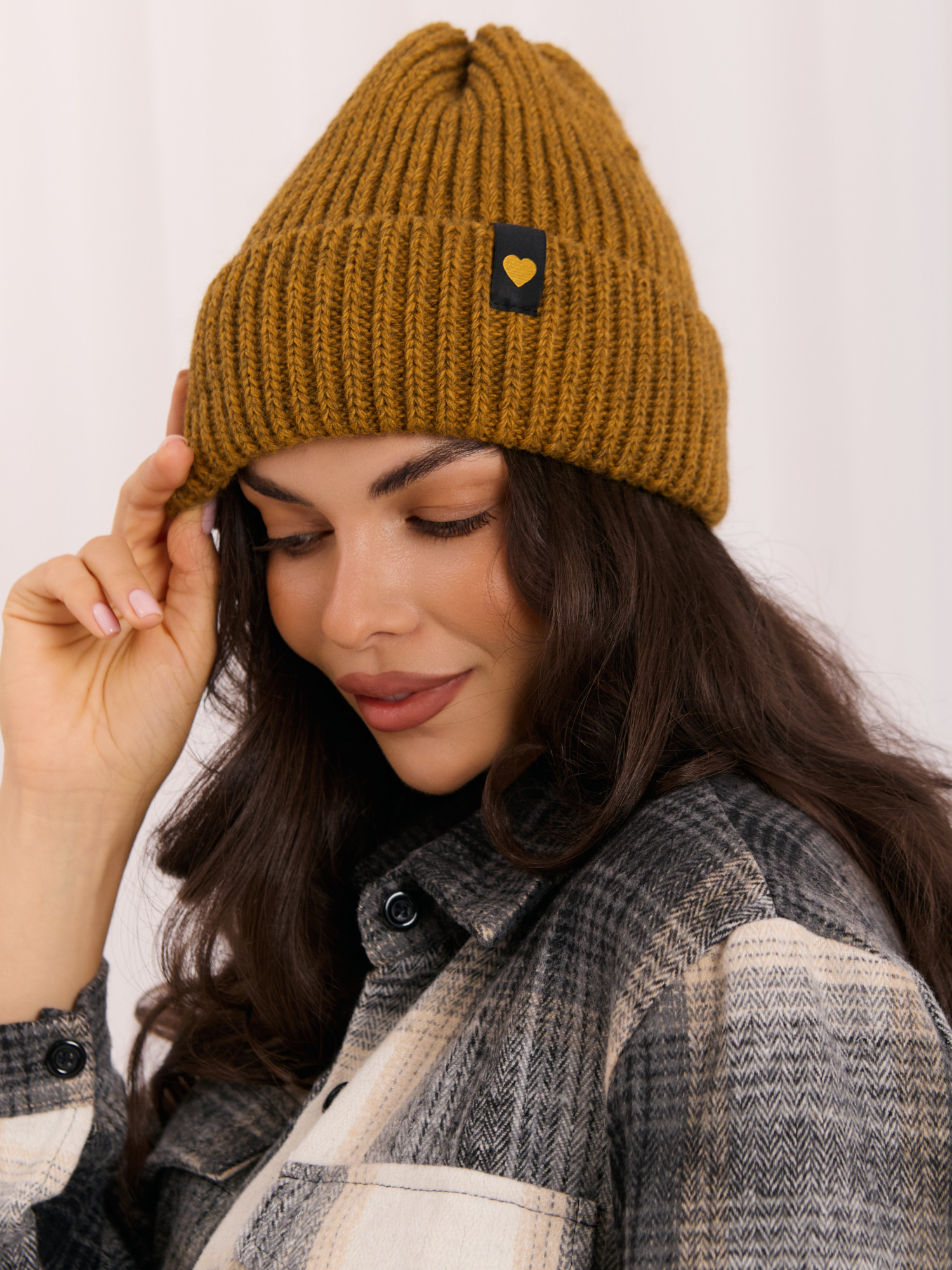 Mustard women's beanie hat with a cuff.