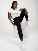 Hurtownia Czarne dresowe spodnie basic z kieszeniami 