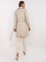 Hurt Beżowy przejściowy płaszcz damski z kieszeniami