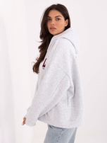 Jasnoszara dresowa bluza z napisem LA