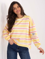 Yellow women's sweatshirt with a longer back.